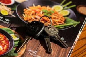 motorcycle keys hiding and hard to see on top of a Menu