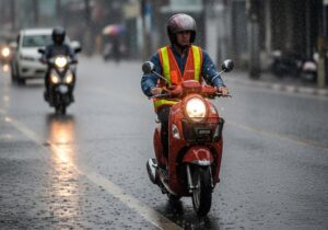 motorcycle riding through rain wearing a fluro vest