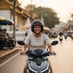 Woman riding scooter in Chiang Mai
